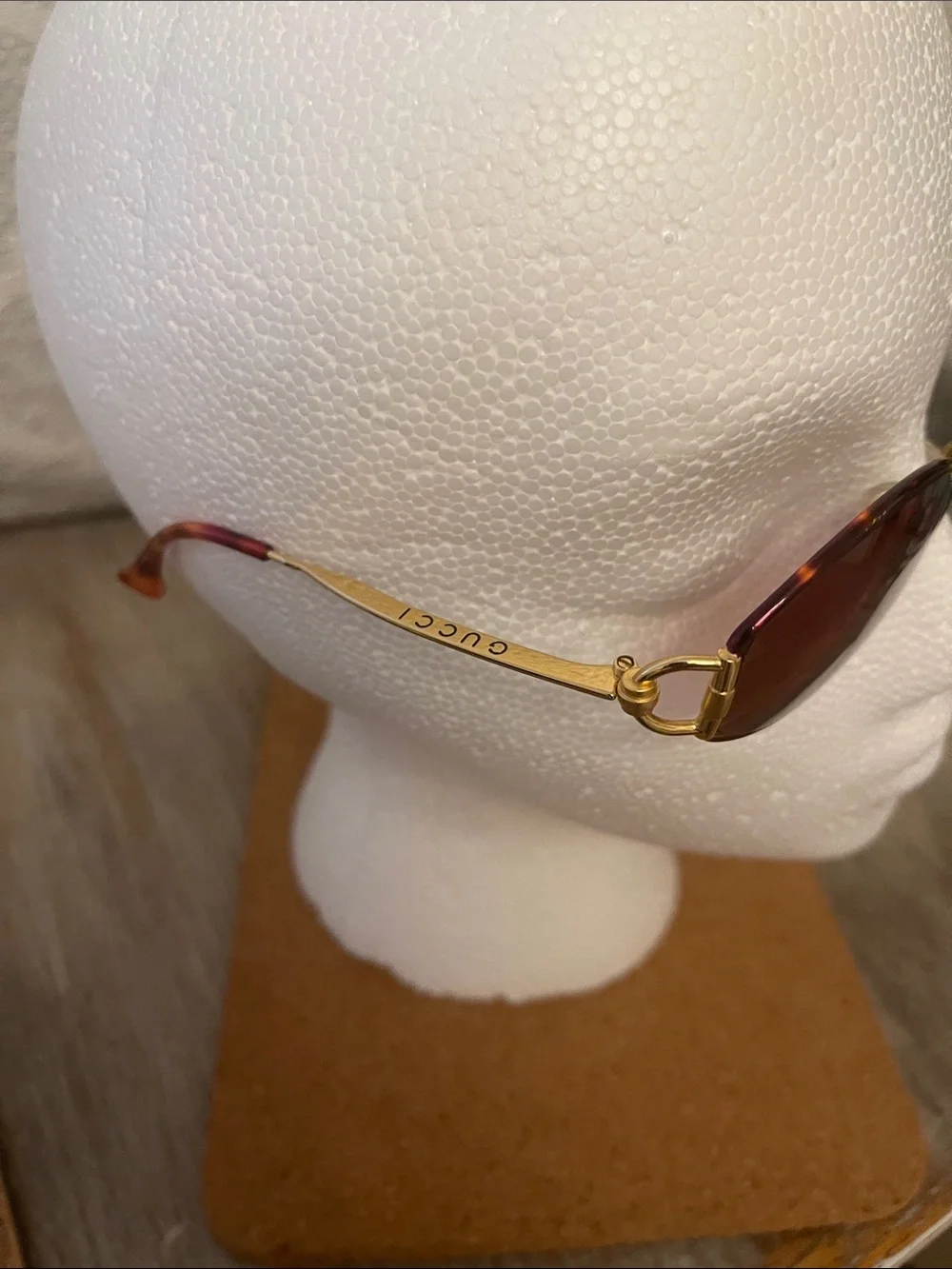 Gucci Oval Gold Frame Sunglasses with Brown Lenses